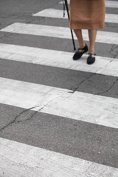 istock Senior pedestrian walking over the street 184847567