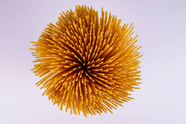 istock Bunch of spaghetti viewed from above on white background 1848477185