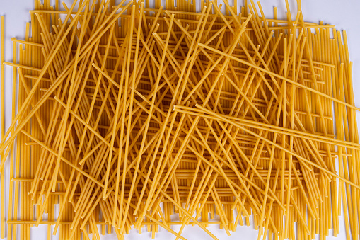 Raw spaghetti lying in disarray