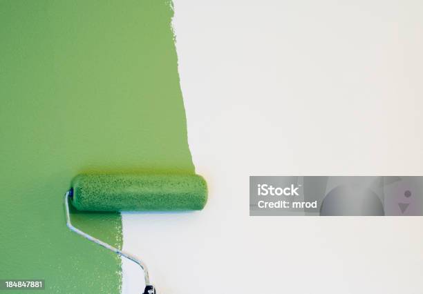 Paint Roller Painting A Wall Stock Photo - Download Image Now - Painting - Activity, Green Color, Wall - Building Feature
