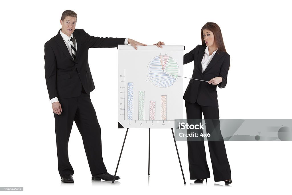 Casal de negócios com um flip chart - Royalty-free Apresentação - Discurso Foto de stock