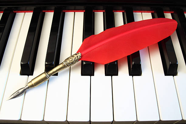 istock Piano keyboard and quill pen 184848343