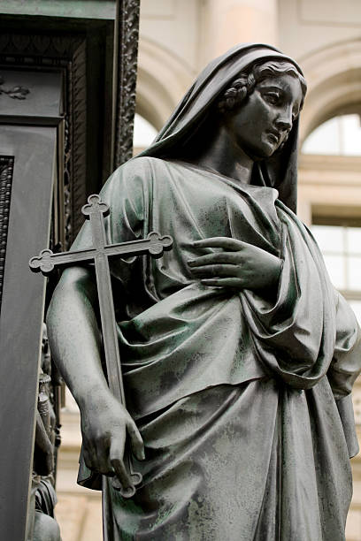 istock Woman with cross 184848753
