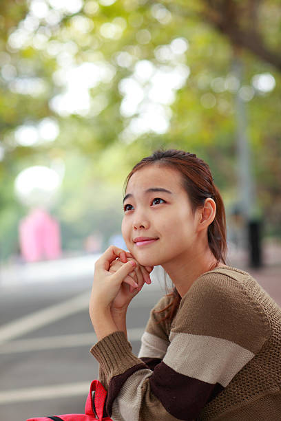 istock daydreaming girl 184849908
