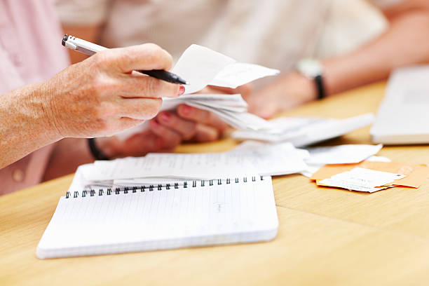 istock Senior couple calculating home finances 184850268