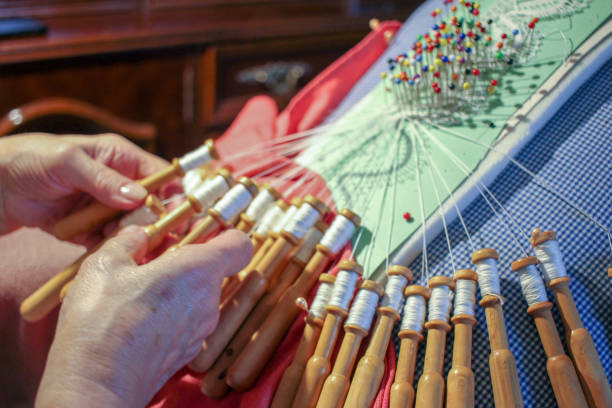 istock old woman crafting bobbin lace with grace 1848504421