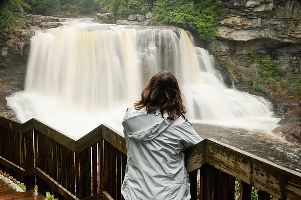 Photo of Woman admiring Blackwaterfalls, West Virginia