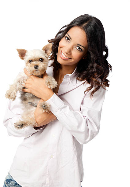istock Woman holdin puppy 184851206