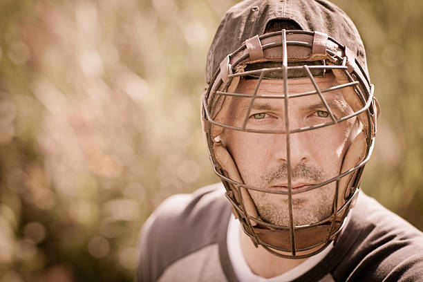 istock Vintage Baseball Player Wearing Catcher's Mask, with Copy Space 184851296