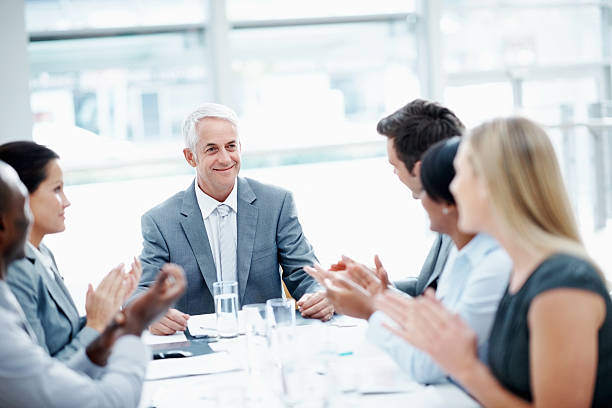 istock Business team congratulating leader 184851377