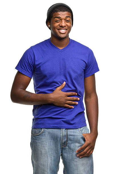 istock Cheerful Young Man Pats Stomach 184851984