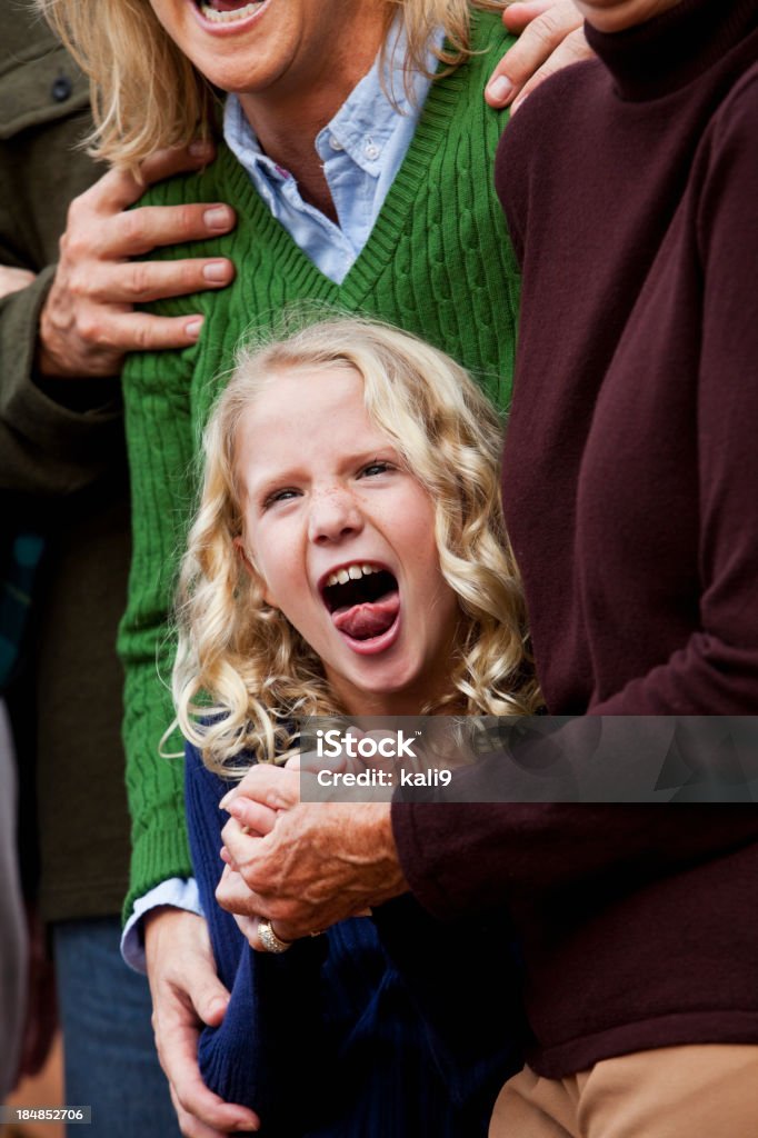 Feliz niña sosteniendo abuela manos - Foto de stock de 6-7 años libre de derechos