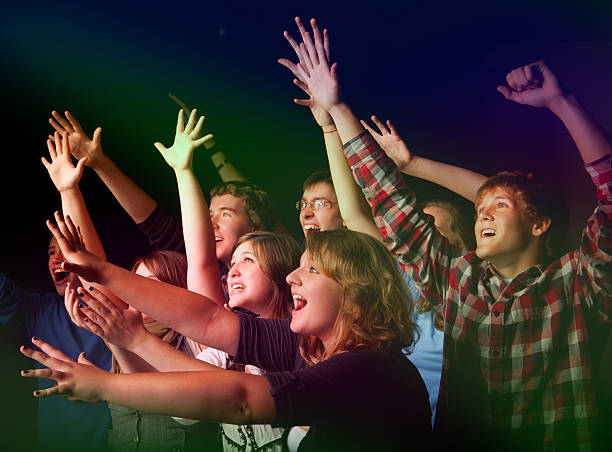 istock Teens celebrating at a concert or event 184852715