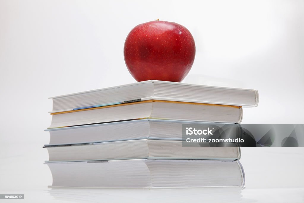 Stack of books and red apple Stack of books and red apple. See more :::: Advice Stock Photo