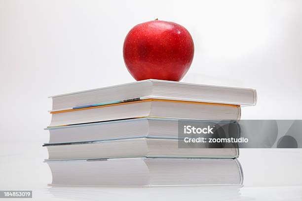 Stack Of Books And Red Apple Stock Photo - Download Image Now - Advice, Apple - Fruit, Book