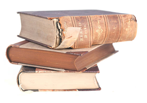istock antique book staple on white background 184853047