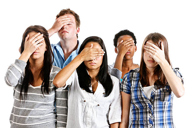 istock I can't look! Five young people cover eyes in dismay 184853377