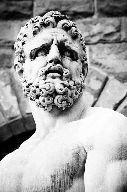 Hercules "Michelangelo's David statue located in Piazza della Signoria in Florence, Italy. Sculptor, Baccio Bandinelli (1533)." hercules florence italy muscular build statue stock pictures, royalty-free photos & images