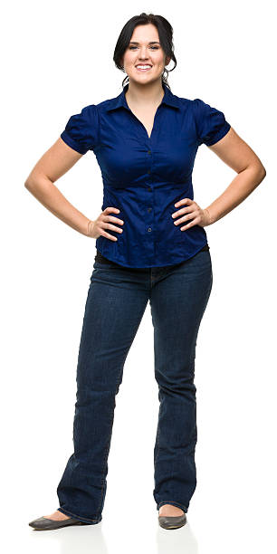 istock Happy Young Woman Standing With Hands on Hips 184854389
