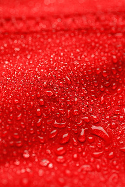 istock Waterproof textile after rain - covered with water drops 184854394