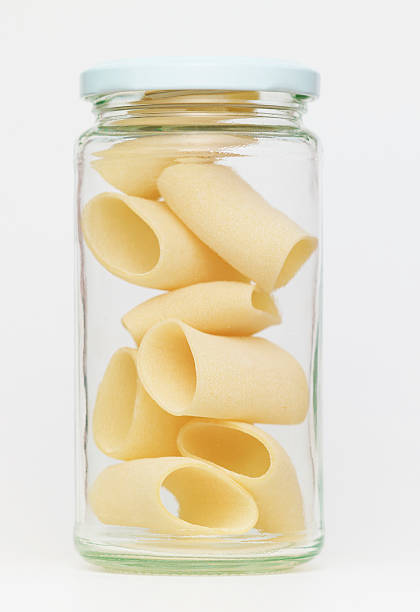 istock Pasta in glass jar on a white background 184855507
