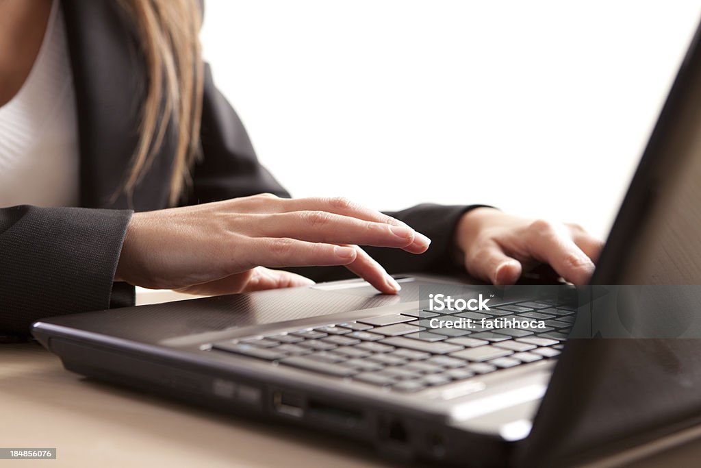 Hand and Computer Female hand on touchpad. Business Stock Photo