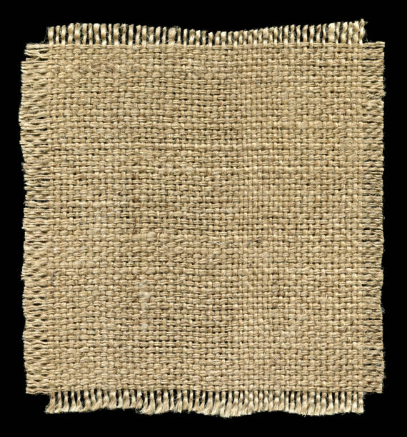 istock Piece of Burlap textured isolated on black background 184856226
