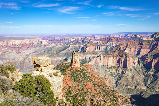 Wide angle image of the arid, desert landscape of the Grand Canyon from the north rim of Grand Canyon National Park Arizona.