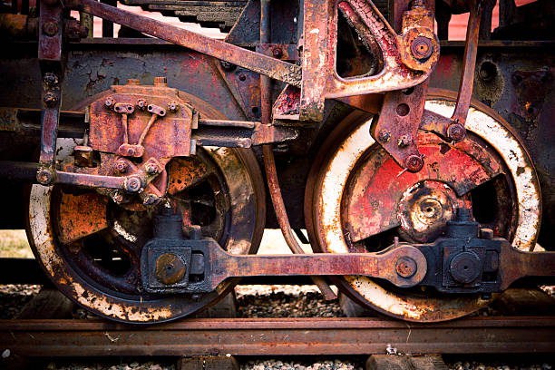 Detail of old steam locomotive's wheel