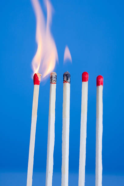 istock Close Up Of Lit Matches 184856627