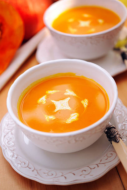 istock Pumpkin soup with creme fraiche 184856794