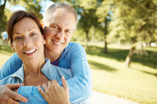 istock Mature couple smiling outdoors 184856908