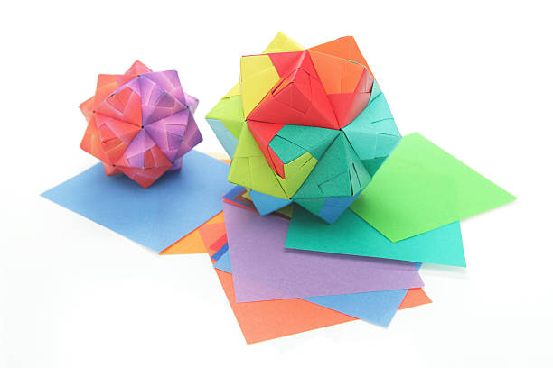 istock Two colorful origami polyhedron paper craft designs 184857023