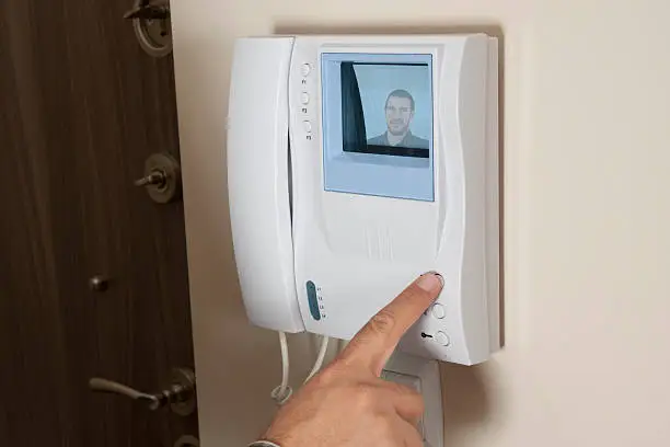 a man using the intercom