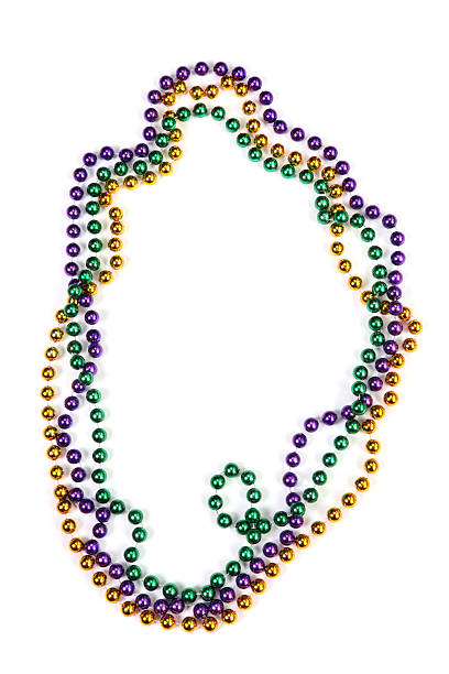 Mardi Gras Beads Mardi Gras beads isolated on white bead stock pictures, royalty-free photos & images