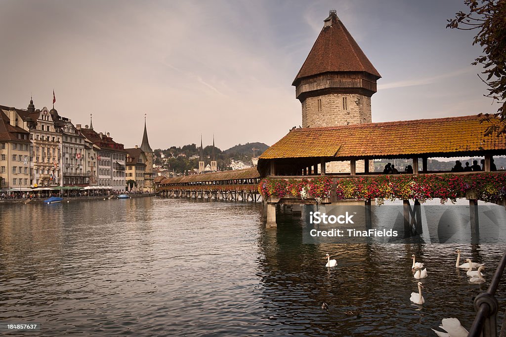 Lucerne, Switzerland "Lucerne, view of old city center, Reuss river, and the famous landmark Chapel bridge (Kapell brAcke)," Architecture Stock Photo