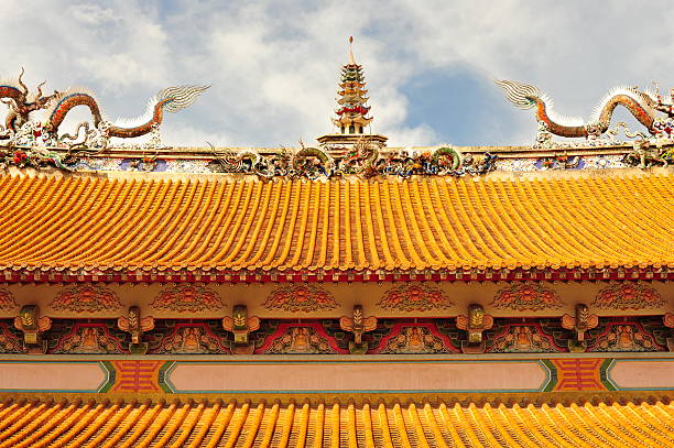 Kyoto, Japan - October 10th, 2023: Detailed Close-up view of the decorative famous Kiyomizu-dera Pagoda under a blue autumn sky in Kyoto Japan.