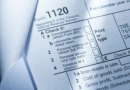 Tax  form with glasses.