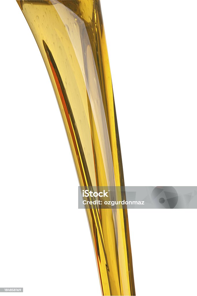 Engine oil "Oil pouring from a plastic bottle, isolated on white" Motor Oil Stock Photo