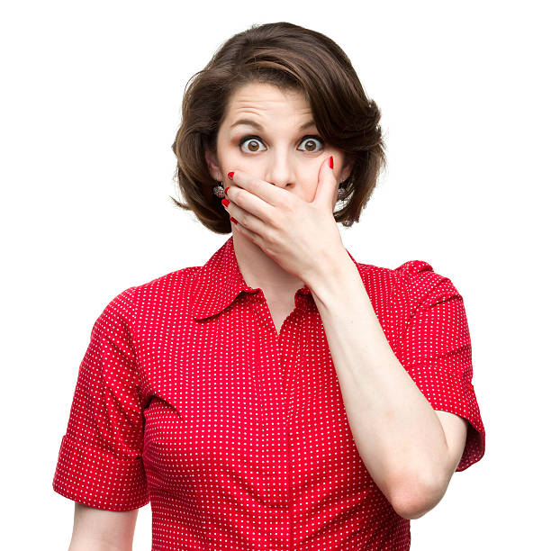 istock Shocked Woman Covers Mouth 184858290