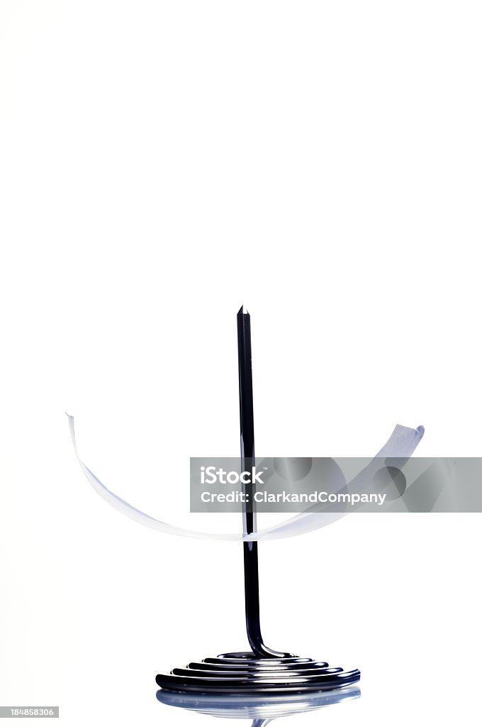 Bill or Receipt Spike Holder. "Receipt spike holder with a single receipt on it, maybe representing efficiency." Abstract Stock Photo