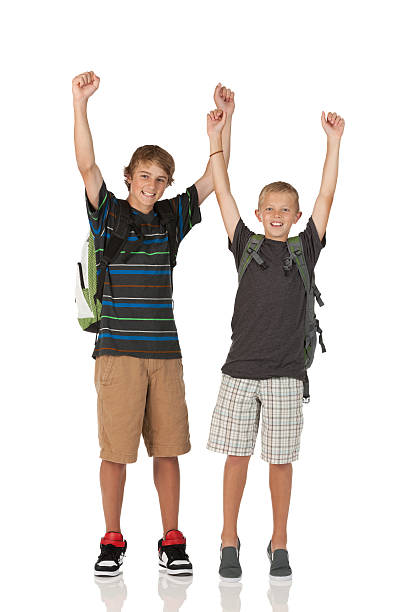 istock Two teenage boys cheering 184859281