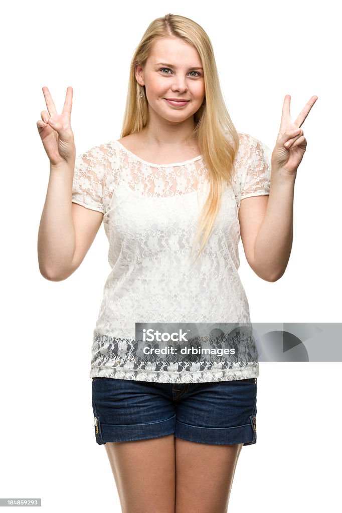 Content Young Woman Gestures Peace Signs Portrait of a young woman on a white background. http://s3.amazonaws.com/drbimages/m/vi.jpg 20-24 Years Stock Photo