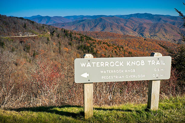 Waterrock Knob Viewpoint, Blue Ridge Parkway, North Carolina, USA "A wide angle view of the view from Waterrock Knob on the Blue Ridge Parkway in North Carolina, USA and showing the beautiful fall colours. It is the highest peak in the Plott Balsams and is the 16th highest mountain in the Eastern United States. Its also the 15th highest of the 40 mountains over 6000 feet in North Carolina. Image taken in late evening sunshine.Similar images:" high country stock pictures, royalty-free photos & images