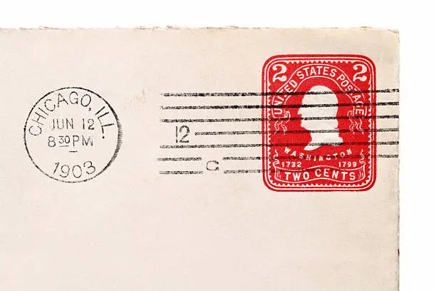 "This is a studio shot of the corner of a vintage envelope with an authentic 1903 postmark and stamp. It was mailed on June 12, 1903 and postmarked in Chicago, IL, USA. There is a two cent red Washington printed stamp on the envelope."