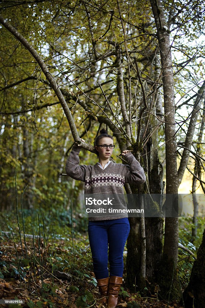 Ugly sweater nature woman A cute young woman wearing a ugly brown sweater in the middle of nature.More of this model from recent shoots. Adult Stock Photo