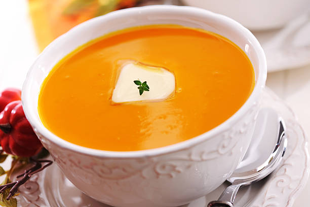 istock Pumpkin creme soup with melted butter 184860477