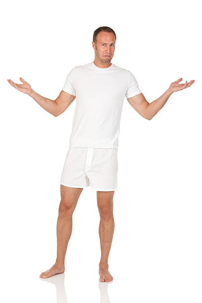 남자 어깨를 으쓱거림 하는 얼굴 - underwear men shorts isolated 뉴�스 사진 이미지