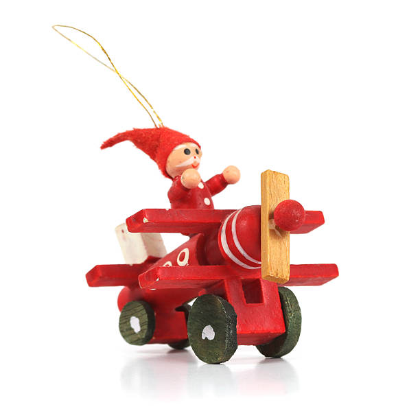 istock Wooden Biplane Christmas Ornament on white. 184861164