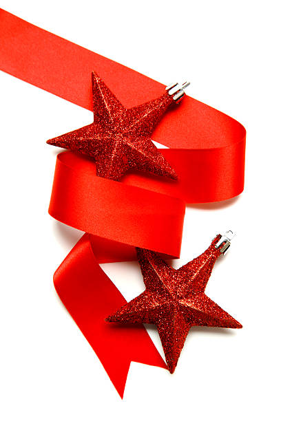 istock Two red glittery star baubles wrapped in red ribbon 184861260